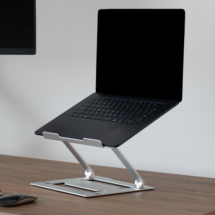 Laptop riser on standing desk