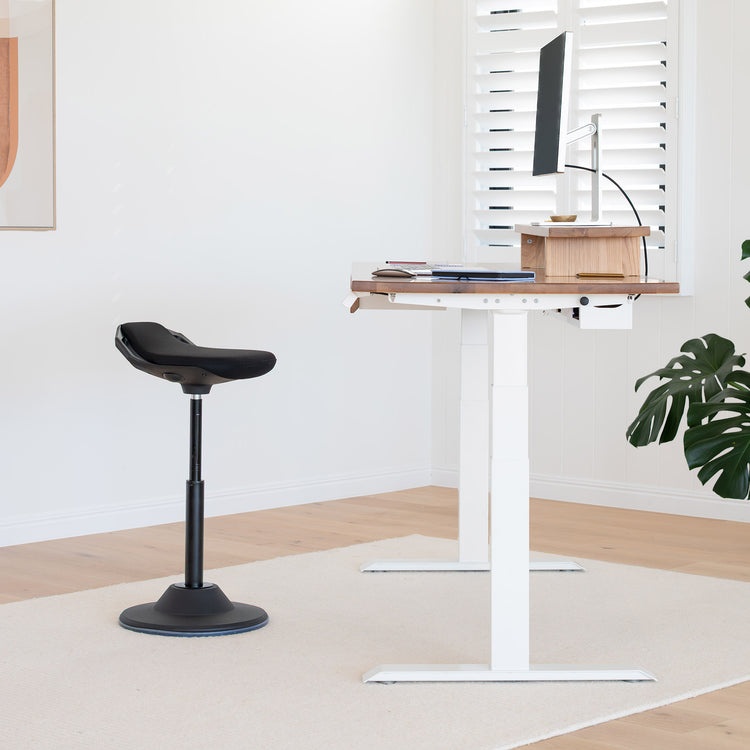 Black sit stand pro active stool standing desk setup