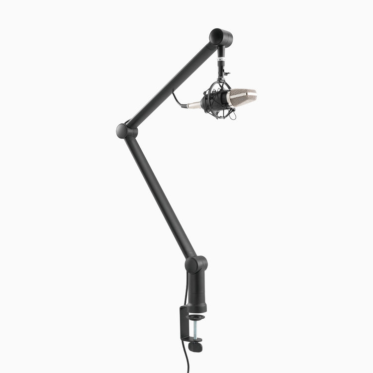 Adjustable microphone boom arm
