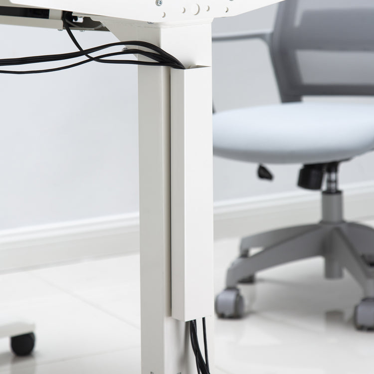 White desky magentic cable management attached to leg