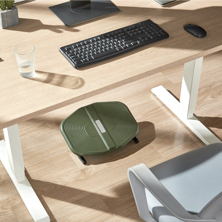 Textured foot rest in green under desk