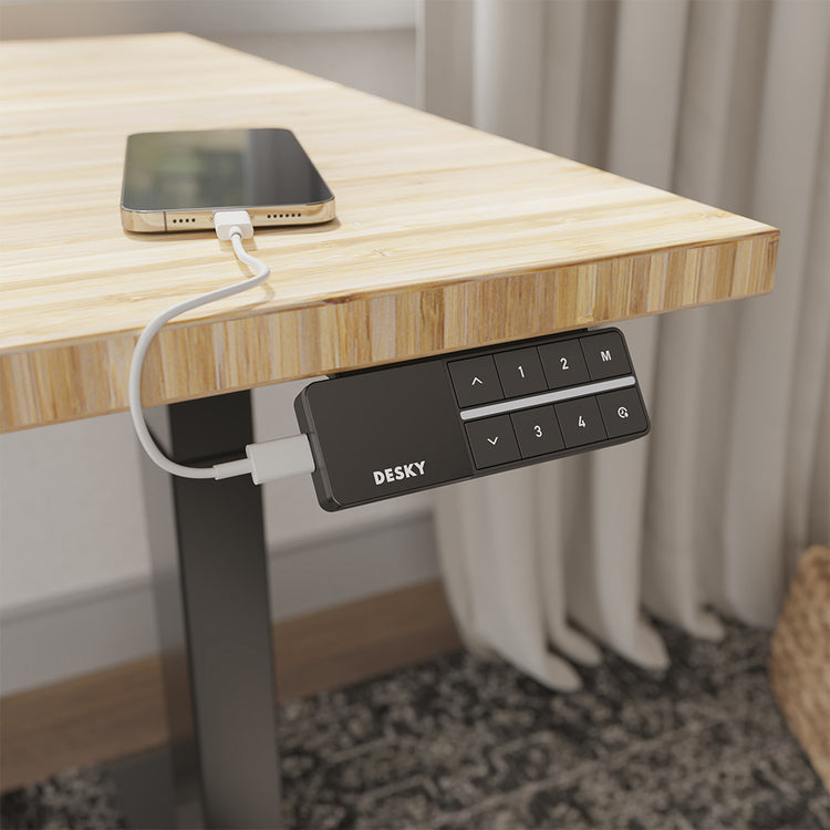 Standing desk bluetooth controller attached to desk