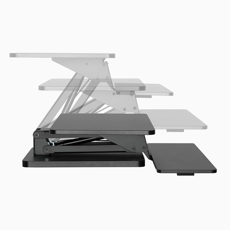 Foldable standing desk converter