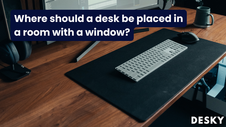 Where should a desk be placed in a room with a window?