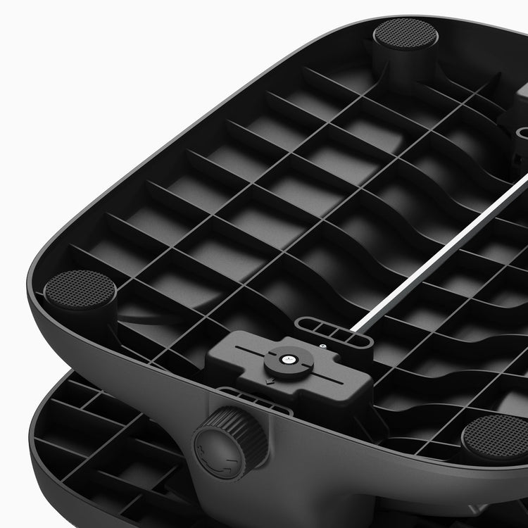reinforced steel base of height adjustable cushioned foot rest