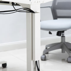 White desky magentic cable management attached to leg