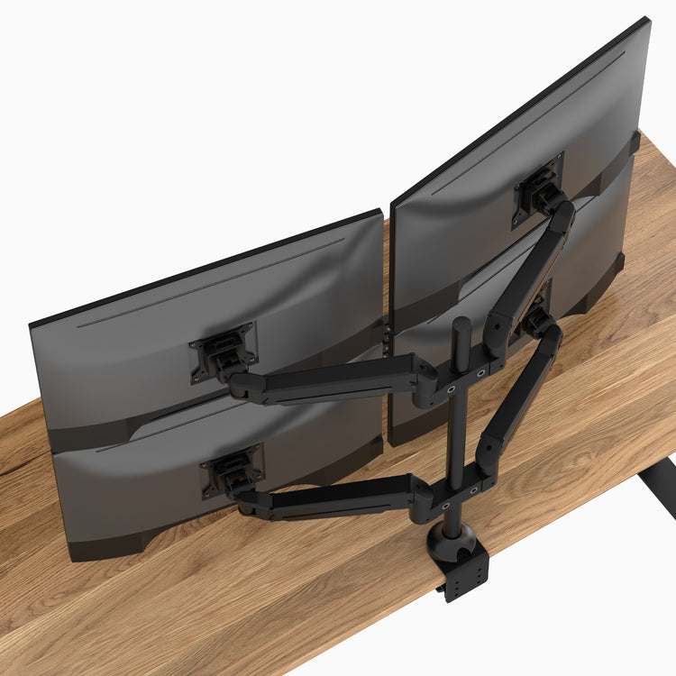 Quad monitor setup with black monitor arm 