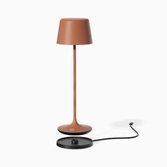 Desky cordless silhouette desk lamp with magnetic charging dock in terracotta