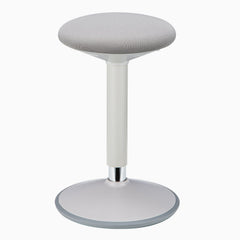 Minimalist white ergonomic stool