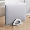 Adjustable laptop stand on top of table with laptop